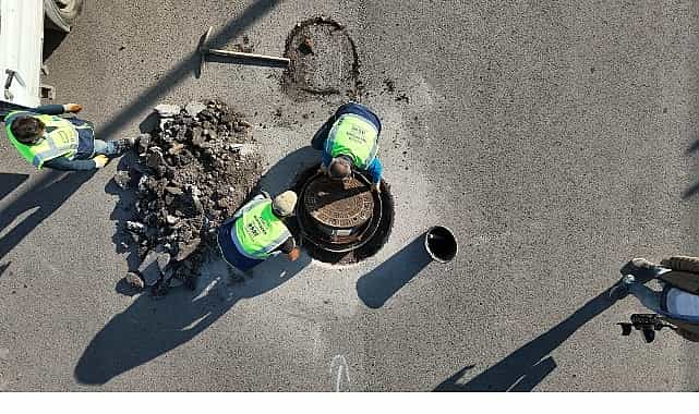 asattan kanalizasyon hatti temizligi ve kapak duzenleme calismasi