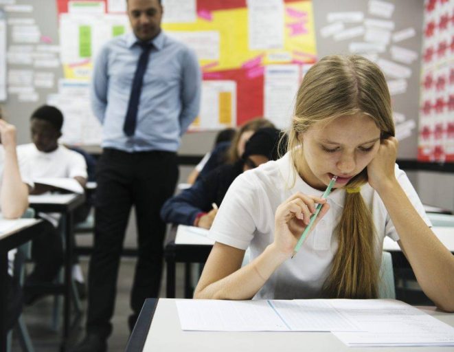 students doing the exam in classroom 2022 12 16 00 52 44 utc 1024x748